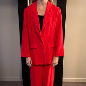 Red suit by A Wish Come True plus black cropped tank under